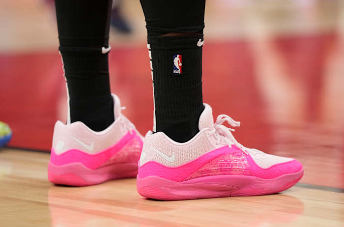 Kevin Durant's pink and white Nike sneakers.